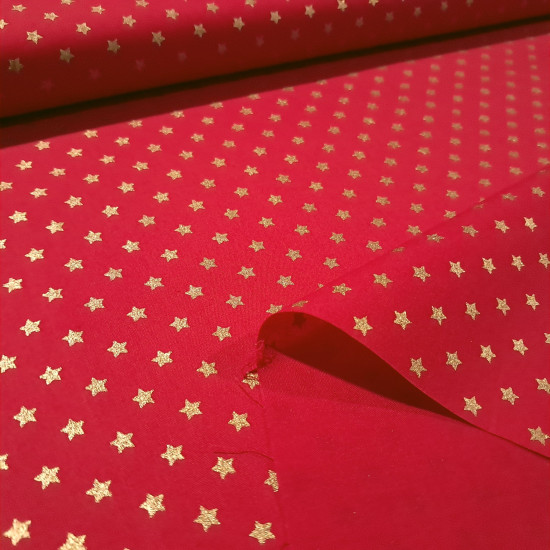 Cotton Christmas Golden Stars fabric Cotton Christmas Golden Stars fabric - Christmas cotton fabric with drawings of golden stars on various backgrounds to choose from. A fabric that can be combined with other colors and create a warm atmosphere for Christmas. The composition of the fabric i