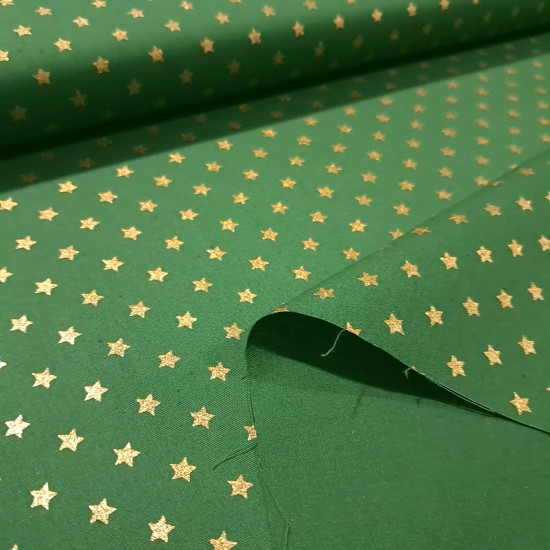 Cotton Christmas Golden Stars fabric Cotton Christmas Golden Stars fabric - Christmas cotton fabric with drawings of golden stars on various backgrounds to choose from. A fabric that can be combined with other colors and create a warm atmosphere for Christmas. The composition of the fabric i