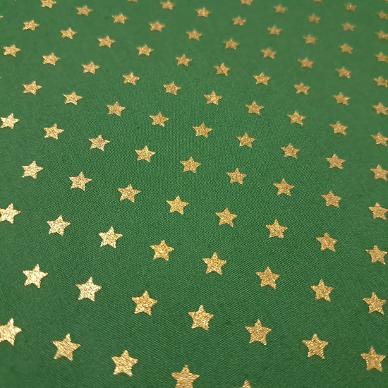 Cotton Christmas Golden Stars fabric Cotton Christmas Golden Stars fabric - Christmas cotton fabric with drawings of golden stars on various backgrounds to choose from. A fabric that can be combined with other colors and create a warm atmosphere for Christmas. The composition of the fabric i