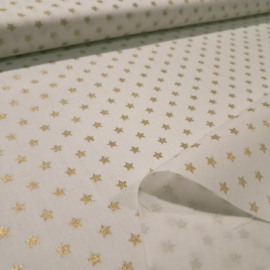 Cotton Christmas Golden Stars fabric Cotton Christmas Golden Stars fabric - Christmas cotton fabric with drawings of golden stars on various backgrounds to choose from. A fabric that can be combined with other colors and create a warm atmosphere for Christmas. The composition of the fabric i