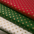 Cotton Christmas Golden Stars fabric Cotton Christmas Golden Stars fabric - Christmas cotton fabric with drawings of golden stars on various backgrounds to choose from. A fabric that can be combined with other colors and create a warm atmosphere for Christmas. The composition of the fabric i