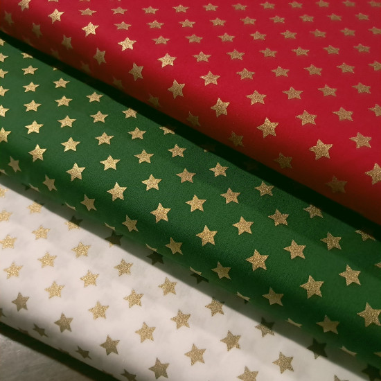 Cotton Christmas Golden Stars fabric Cotton Christmas Golden Stars fabric - Christmas cotton fabric with drawings of golden stars on various backgrounds to choose from. A fabric that can be combined with other colors and create a warm atmosphere for Christmas. The composition of the fabric i