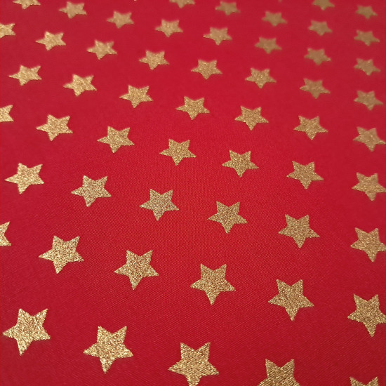 Cotton Christmas Golden Stars fabric Cotton Christmas Golden Stars fabric - Christmas cotton fabric with drawings of golden stars on various backgrounds to choose from. A fabric that can be combined with other colors and create a warm atmosphere for Christmas. The composition of the fabric i