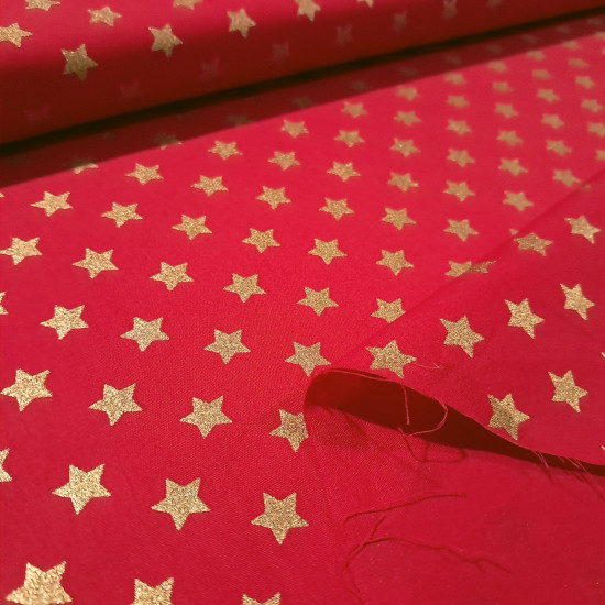 Cotton Christmas Golden Stars fabric Cotton Christmas Golden Stars fabric - Christmas cotton fabric with drawings of golden stars on various backgrounds to choose from. A fabric that can be combined with other colors and create a warm atmosphere for Christmas. The composition of the fabric i