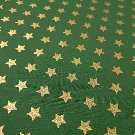 Cotton Christmas Golden Stars fabric Cotton Christmas Golden Stars fabric - Christmas cotton fabric with drawings of golden stars on various backgrounds to choose from. A fabric that can be combined with other colors and create a warm atmosphere for Christmas. The composition of the fabric i