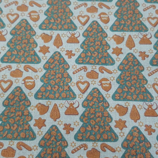 Cotton Christmas Fir Trees Cookies Gingerbread fabric - Cotton fabric digital printing with drawings of trees with gingerbread cookies decorating, on a light background. The fabric is 140cm wide and its composition is 100% cotton.