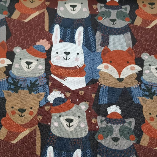 Cotton Christmas Animals Warm Group fabric - Christmas organic cotton fabric with drawings of animals warm with hats and scarf. The fabric is 150cm wide and its composition is 100% cotton.