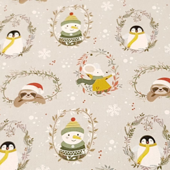 Cotton Christmas Animals Snowmen fabric - Organic cotton poplin fabric with drawings of forest animals and snowmen with scarves and hats inside floral circles on a light background with snowflakes. The fabric is 150cm wide and its composition is 100% cott