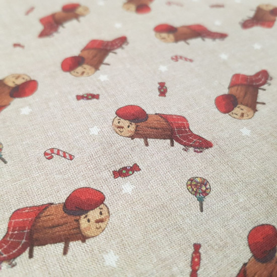 Cotton Christmas Caga Tió Candies fabric - Christmas poplin cotton fabric with drawings of the caga tió on a rustic background with white stars and candies such as lollipops, canes... The fabric is 150cm wide and its composition is 100% cotton.