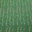 Cotton Christmas Garland Lights fabric - Christmas-themed cotton poplin fabric with drawings of garlands of lights on a green background with white stars. The fabric is 150cm wide and its composition is 100% cotton.