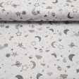 Tela Piqué Lunas Nubes Globos - Tela de piqué canutillo con dibujos de lunas, nubes, globos y soles en tonos de color gris sobre fondo blanco. La tela mide 150cm de ancho y su composición mezcla de algodón y poliéster. 