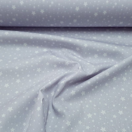 Piqué Stars Arturo fabric - Children's cotton piqué fabric with patterned white stars of various sizes on a gray background. The fabric is 150cm wide and its composition is 100% cotton.