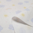 Pique Rainbow Clouds fabric - Pique fabric with children's drawings of clouds, rainbows and suns on a white background. The fabric is 150cm wide and its composition is 100% cotton.