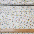 Pique Teddy Color Circles fabric - Cotton pique fabric with drawings of colored circles on a white background. The fabric is 160cm wide and its composition is 100% cotton.