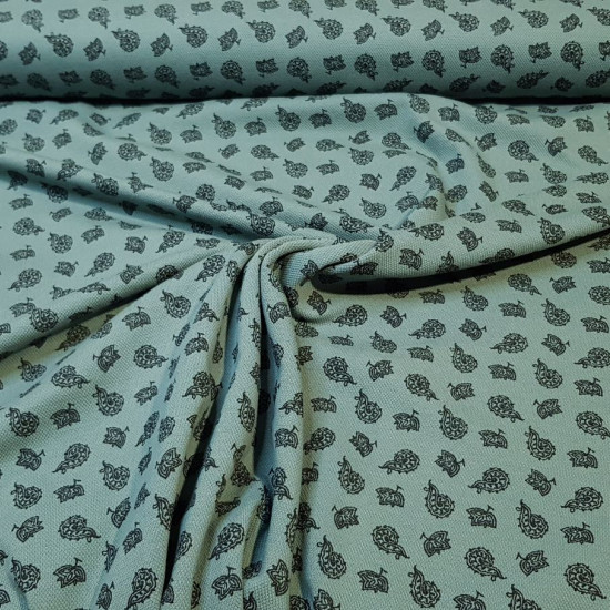 Piqué Stretch Cachemir - Tela de piqué algodón con elastano, ideal para confeccionar camisetas de polo por ejemplo, ya que esta tela es elástica. Tiene dibujos de cachemir sobre un fondo verde envejecido. La tela mide 16