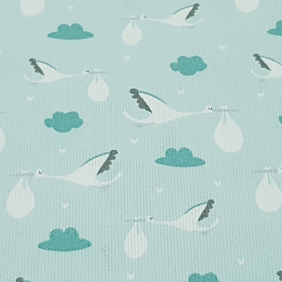 Pique Green Storks fabric - Children's themed pique fabric with drawings of storks and clouds where green and white colors predominate. The pique fabric is ideal for making baby lullabies, sachets, changing tables ... The fabric is 160cm wide a