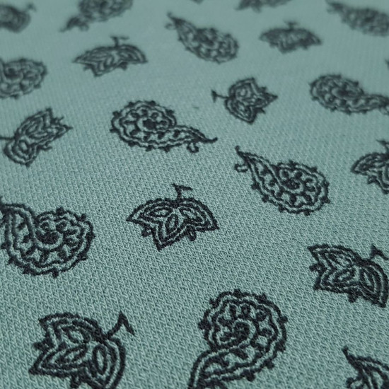 Pique Stretch Knit Cashmere fabric - Cotton piqué fabric with elastane, ideal for making polo shirts, for example, as this fabric is elastic. It has paisley patterns on an aged green background. The fabric is 160cm wide and its composition is 96%
