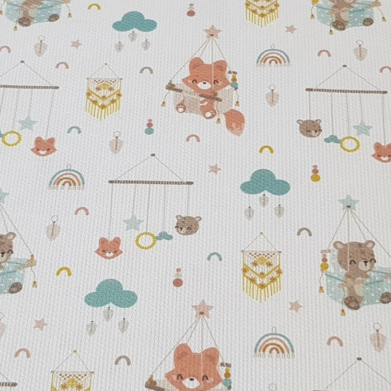 Cotton Pique Teddy Bears Foxes Dreams fabric - Cotton pique fabric with children's drawings of little foxes and bears with baby mobiles and dream catchers on a white background with rainbows and clouds. The fabric is 160cm wide and its composition is 100%