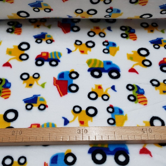 Coral Fleece Construction Trucks fabric - Children's coral fleece fabric with drawings of colorful trailer trucks, tractors and concrete mixers on a white background. Coral fabric is very soft to the touch and is widely used in children's clothing. T