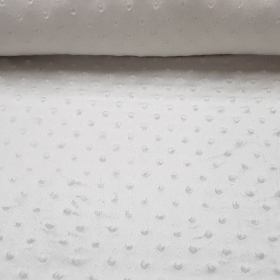 Fleece Minky Buttons fabric - Soft and warm Minky fleece fabric with raised bumps or buttons. This fabric is ideal for making baby lullabies, children's blankets, trolley covers ... and much more The fabric is 150cm wide and its composition is 10
