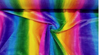 Tela Polar Coralina Arcoiris - Tela de polar coralina con dibujo de arcoiris. Las franjas van siguiendo el largo de la tela. La tela mide 150cm de ancho y su composición 100% poliester.