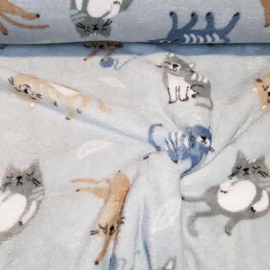 Coral Fleece Kittens fabric - Very soft coral fleece fabric with pictures of happy kittens on a light-colored background. The fabric is 150cm wide and its composition is 100% polyester.