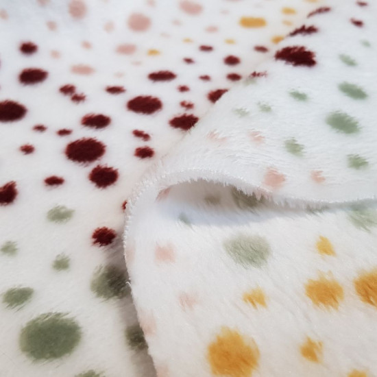 Coral Fleece Dots fabric - Coral fleece fabric with drawings of dots of various colors and sizes on a white background. The fabric is 150cm wide and its composition is 100% polyester.