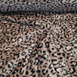 Coral Fleece Animal Print fabric - Coral fleece fabric very soft and pleasant to the touch with animal print drawings. The fabric is 150cm wide and its composition is 100% polyester.