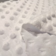 Tela Polar Minky Botones - Tela de polar tipo Minky suave y calentita con protuberancias o botones en relieve. Esta tela es ideal para la confección de arrullos para bebé, mantas infantiles, fundas para el carrito… y mucho más La tela mide 150
