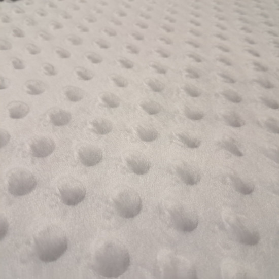 Tela Polar Minky Botones - Tela de polar tipo Minky suave y calentita con protuberancias o botones en relieve. Esta tela es ideal para la confección de arrullos para bebé, mantas infantiles, fundas para el carrito… y mucho más La tela mide 150