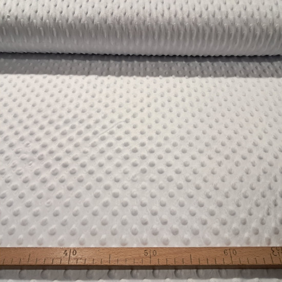 Tela Polar Minky Botones - Tela de polar tipo Minky suave y calentita con protuberancias o botones en relieve. Esta tela es ideal para la confección de arrullos para bebé, mantas infantiles, fundas para el carrito… y mucho más La tela mide 150