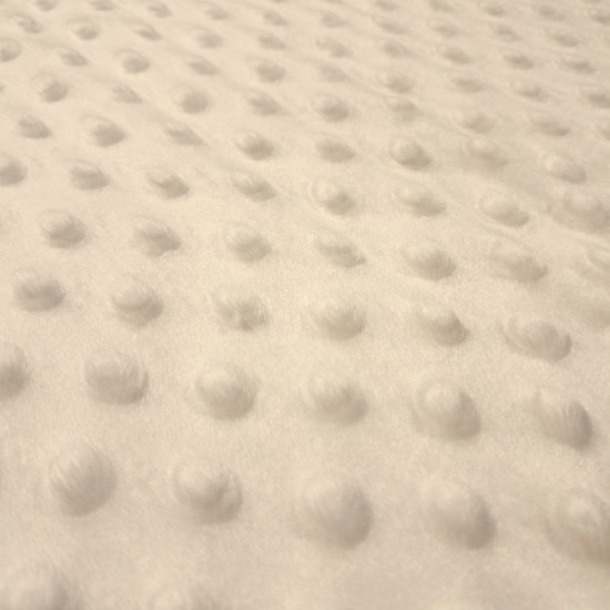 Tela Polar Minky Botones - Tela de polar tipo Minky suave y calentita con protuberancias o botones en relieve. Esta tela es ideal para la confección de arrullos para bebé, mantas infantiles, fundas para el carrito… y mucho más La tela mide 150