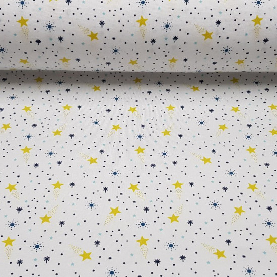 Tela Punto Algodón Estrellas Espacio - Tela de punto algodón con dibujos de varias estrellas de colores y tamaños sobre un fondo blanco. La tela de punto cede un poco ya que lleva en su composición spandex. Ideal para confecciones infantiles de todo tipo.