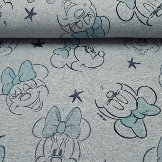 French Terry Disney Minnie Blue fabric - French Terry licensed Disney with drawings of Minnie faces with mint green bows and stars in black lines on a melange gray background. The French Terry fabric can be used to make light sweatshirts, T-shirts, dresse