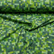 Tela Punto Algodón Pixels - Tela de punto algodón tipo camiseta con estampado de píxeles de colores verdes, recordando un poco al videojuego Minecraft. La tela mide 150cm de ancho y su composición 95% algodón – 5% elastano