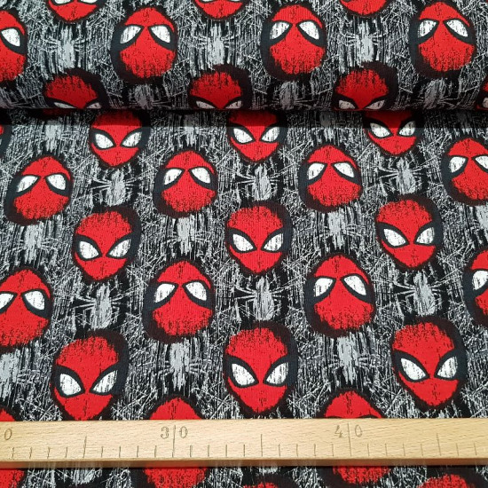 Cotton Jersey Spiderman Mask fabric - Licensed cotton jersey fabric with drawings of the Spiderman mask and cobwebs forming a mosaic. The fabric is 150cm wide and its composition is 92% cotton - 8% elastane