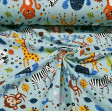 Tela Punto Camiseta Animales Selva Azul - Tela de punto algodón tipo camiseta con dibujos divertidos de animales de la selva saludando, como por ejemplo el tigre, panda, jirafa... La tela mide 150cm de ancho y su composición 95% algodón - 5% elastano.