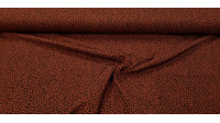 Tela Punto Algodón Animal Print Terracota - Tela de punto algodón tipo camiseta con dibujo animal print en color negro sobre un fondo de color terracota oscuro. La tela mide 150cm de ancho y su composición 95% algodón - 5% elastano