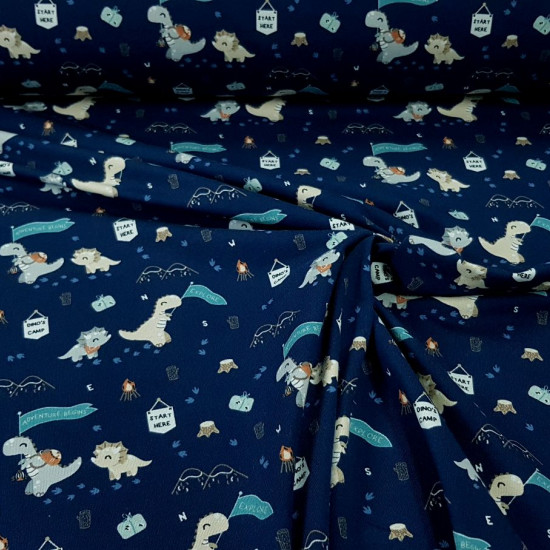 Cotton Jersey Organic Dinosaur Explorers fabric - Organic cotton jersey fabric (GOTS) with drawings of exploring dinosaurs on a dark blue background with exploration and camping motifs. The fabric is 150cm wide and its composition is 95% cotton - 5% elast