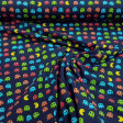 Cotton Jersey Pacman Videogame fabric - Cotton jersey fabric with drawings of the Pacman video game on a navy blue background. The fabric is 150cm wide and its composition is 94% cotton - 6% elastane.