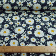 Cotton Jersey Flowers Daisies fabric - Digital printed cotton jersey fabric with drawings of daisy flowers on a navy blue background. The fabric is 150cm wide and its composition is 94% cotton - 6% elastane.