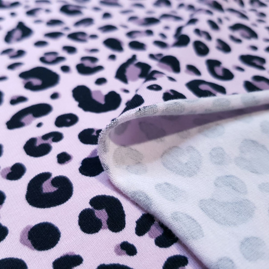 Jersey Animal Print Pink fabric - Cotton jersey fabric, with animal print drawing on a pink background. The fabric is 145cm wide and its composition is 95% cotton - 5% elastane. Cotton jersey fabric is widely used in making children's clothing