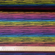 Tela Punto Sudadera Alpenfleece Rayas Multicolor - Tela de punto sudadera alpenfleece con pelito blanco por una de las caras y por la otra cara dibujos de rayas multicolor de tonalidades arcoiris. La tela mide 155cm de ancho y su composición 90% algodón –