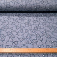 Punto Sudadera Alpenfleece Tigres Sonrientes - Tela de punto sudadera tipo alpenfleece o también llamada sudadera de invierno, con dibujos infantiles de tigres sonrientes sobre un fondo en tono azul. En una de las caras de la tela tiene un pelito muy cort