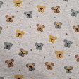 Jogging Alpenfleece Dogs fabric - Alpenfleece jogging fabric, also known as a winter sweatshirt, features children's designs of dog faces on a gray melange background. One side features a very short, soft white pile. The fabric is 150 cm wide and is