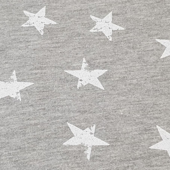 Sweatshirt Alpenfleece Stars fabric - Sweatshirt fabric with fur on one side and drawings of white stars on a melange gray background on the other. The fabric is 150cm wide and its composition is 56% polyester - 40% cotton - 4% elastane.