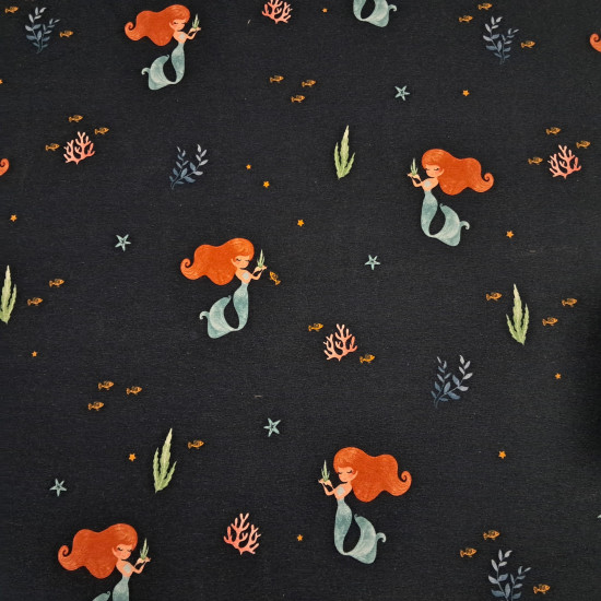 Cotton Jersey Sirens fabric Cotton Jersey Sirens fabric - Cotton jersey fabric with a digital print featuring mermaids, seaweed, and starfish on a dark blue background. The fabric is 140 cm wide and is made of 95% cotton and 5% elastane.