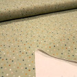 Cotton Jersey Colorful Dots fabric - Cotton jersey fabric with drawings of colored dots on a greenish background. The fabric is 150cm wide and its composition is 95% cotton - 5% elastane.