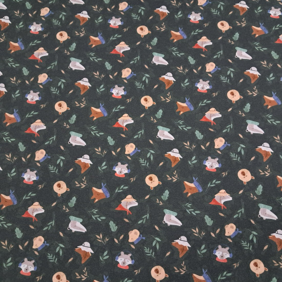 Knit fabric print featuring helmeted raccoons, hat-wearing foxes, and teddy bears on a dark background