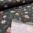 Knit fabric print featuring helmeted raccoons, hat-wearing foxes, and teddy bears on a dark background